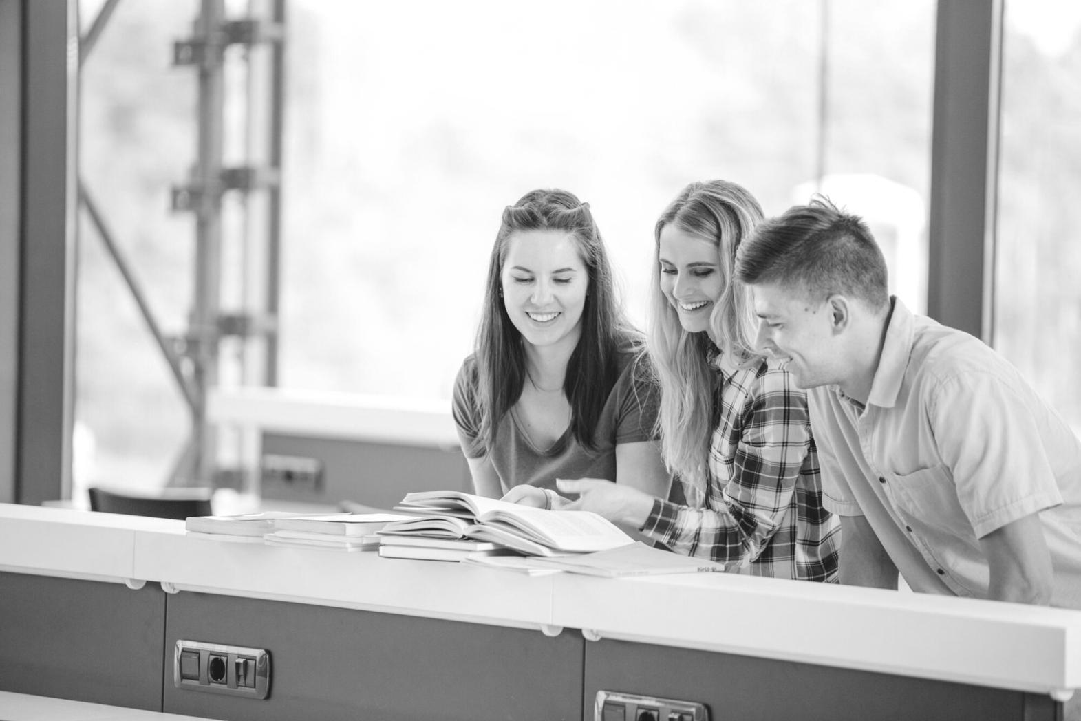 Students engaged in financial planning workshop session